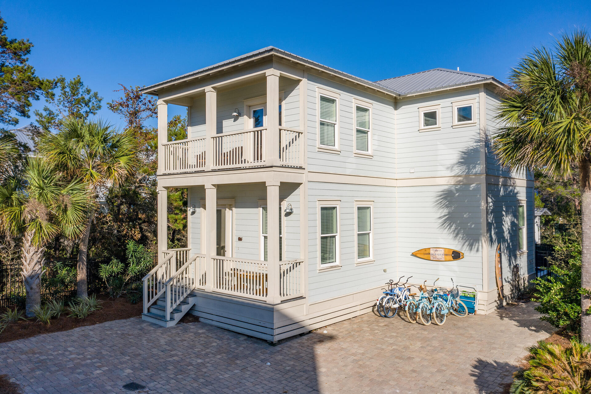56 Abbey Road Santa Rosa Beach, FL 32459 - Photo 3 of 40 a front view of a house with garden
