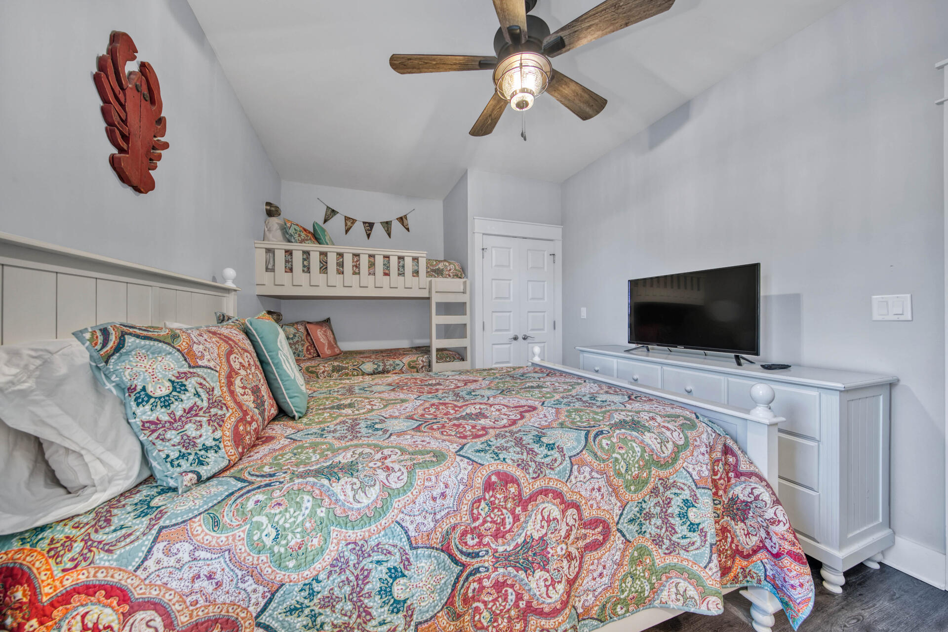 56 Abbey Road Santa Rosa Beach, FL 32459 - Photo 21 of 40 a bedroom with a bed and a flat screen tv