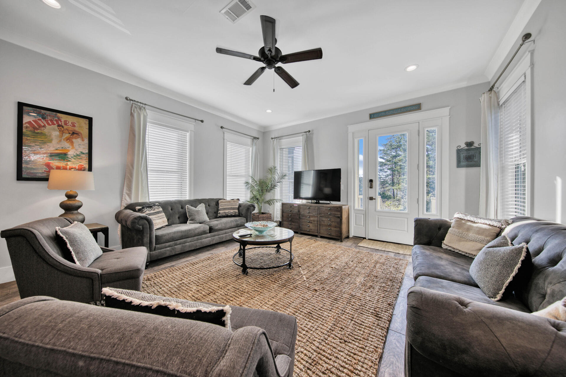 56 Abbey Road Santa Rosa Beach, FL 32459 - Photo 4 of 40 a living room with furniture or couch and a flat screen tv