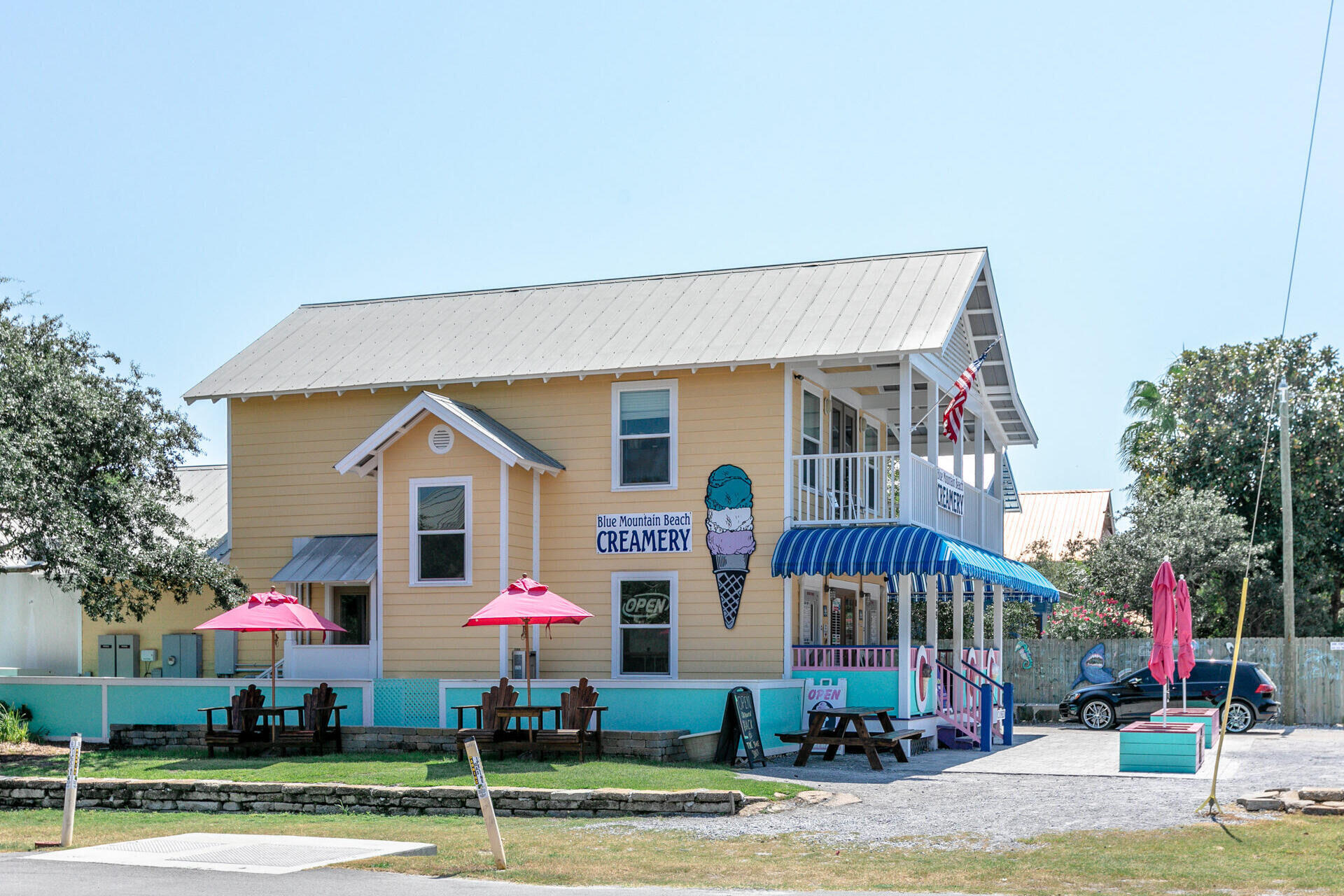 56 Abbey Road Santa Rosa Beach, FL 32459 - Photo 36 of 40 a front view of house with yard and trees in the background