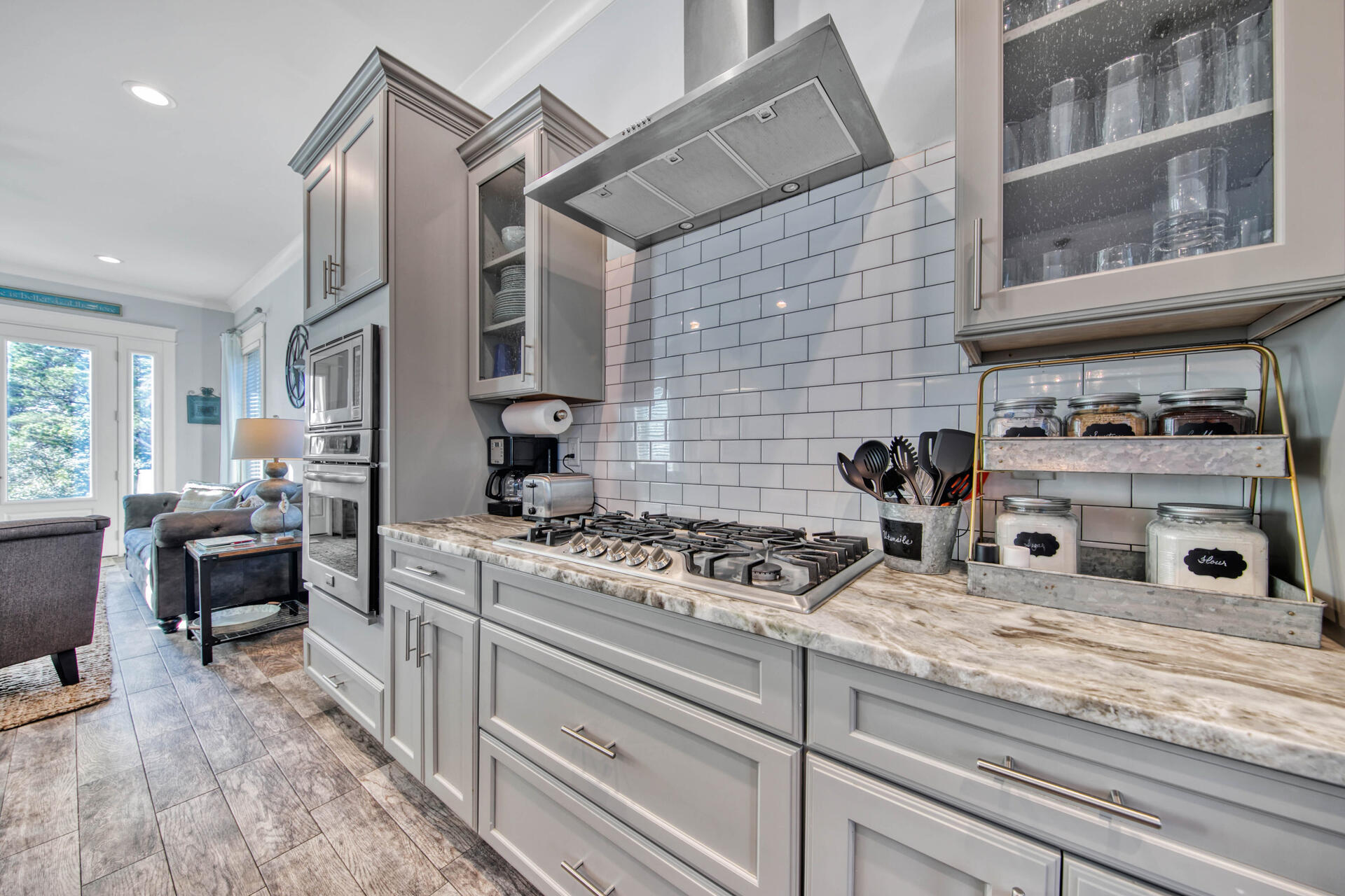 56 Abbey Road Santa Rosa Beach, FL 32459 - Photo 5 of 40 a kitchen with stainless steel appliances granite countertop a stove and cabinets