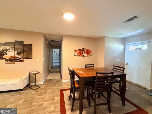 226 Lake Laurel Road Milledgeville, GA 31061 - Photo 11 of 25 a view of a dining room with furniture