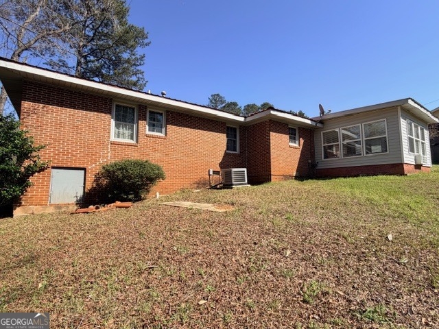 226 Lake Laurel Road Milledgeville, GA 31061 - Photo 2 of 25 a front view of a house with a yard