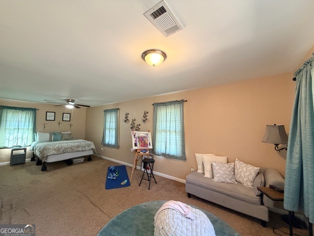 226 Lake Laurel Road Milledgeville, GA 31061 - Photo 21 of 25 a bedroom with furniture and a window