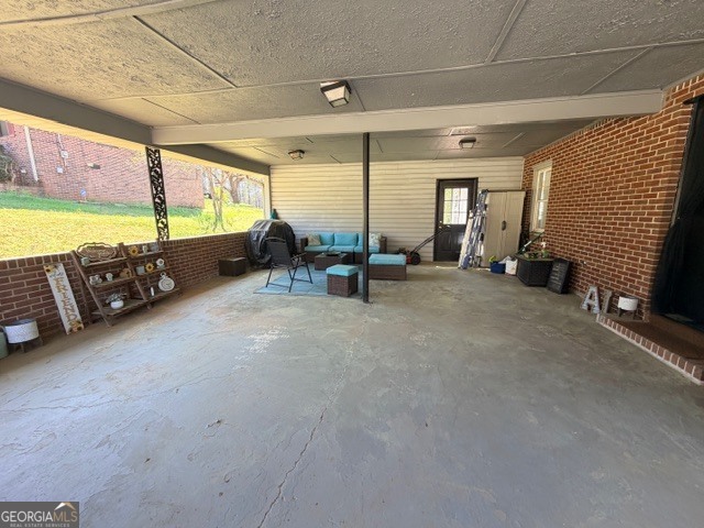 226 Lake Laurel Road Milledgeville, GA 31061 - Photo 5 of 25 a view of a room with gym equipment