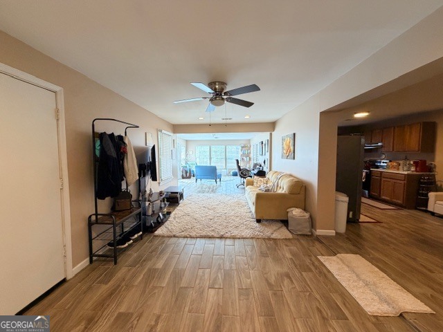 226 Lake Laurel Road Milledgeville, GA 31061 - Photo 7 of 25 a living room with furniture and a flat screen tv