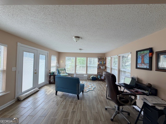 226 Lake Laurel Road Milledgeville, GA 31061 - Photo 8 of 25 a living room with furniture and a large window