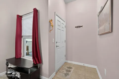 a view of a hallway with closet