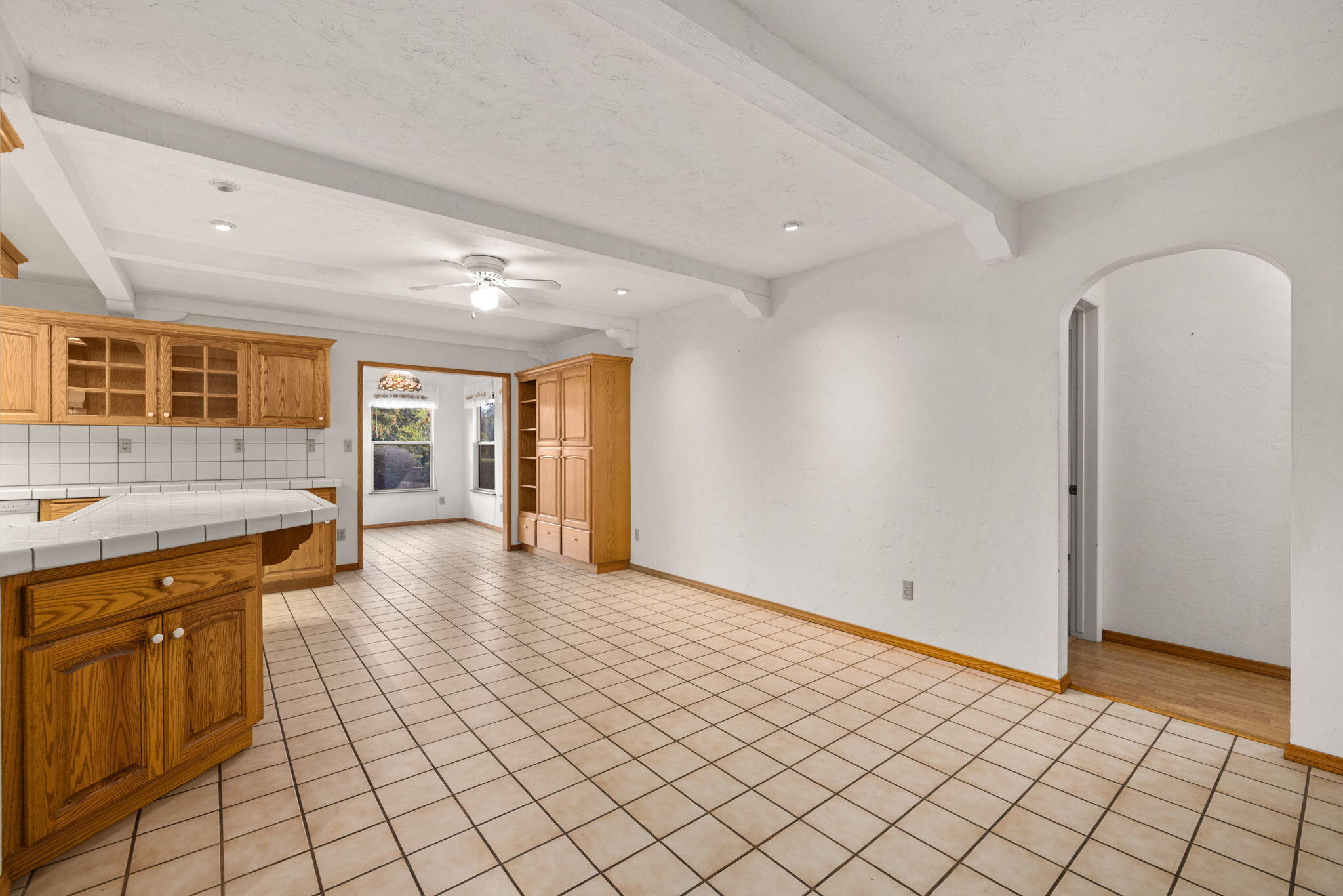 2428 Highland Road Upland, CA 91784 - Photo 16 of 45 a view of a hallway with wooden floor and cabinet