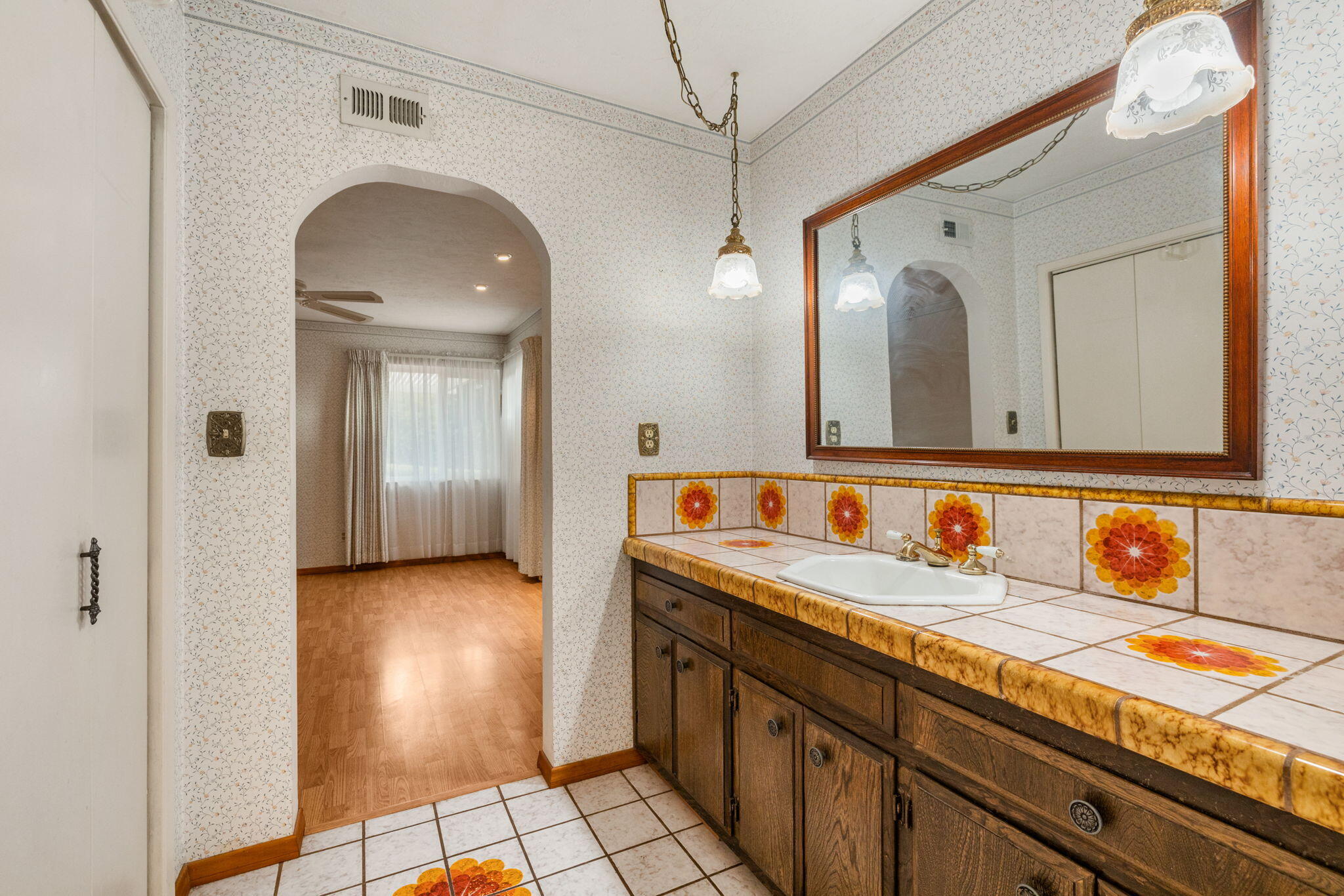 2428 Highland Road Upland, CA 91784 - Photo 23 of 45 a bathroom with a sink and a mirror