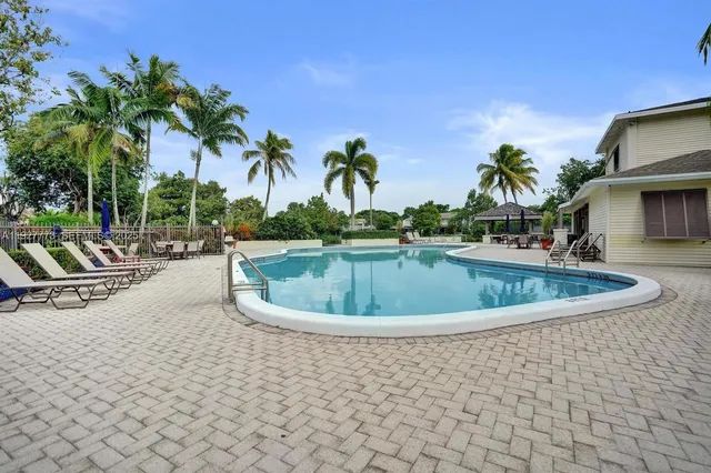 a view of outdoor space with swimming pool