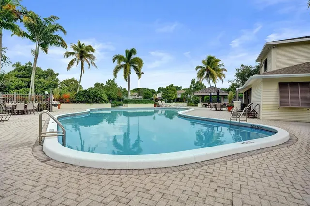a view of outdoor space yard and swimming pool