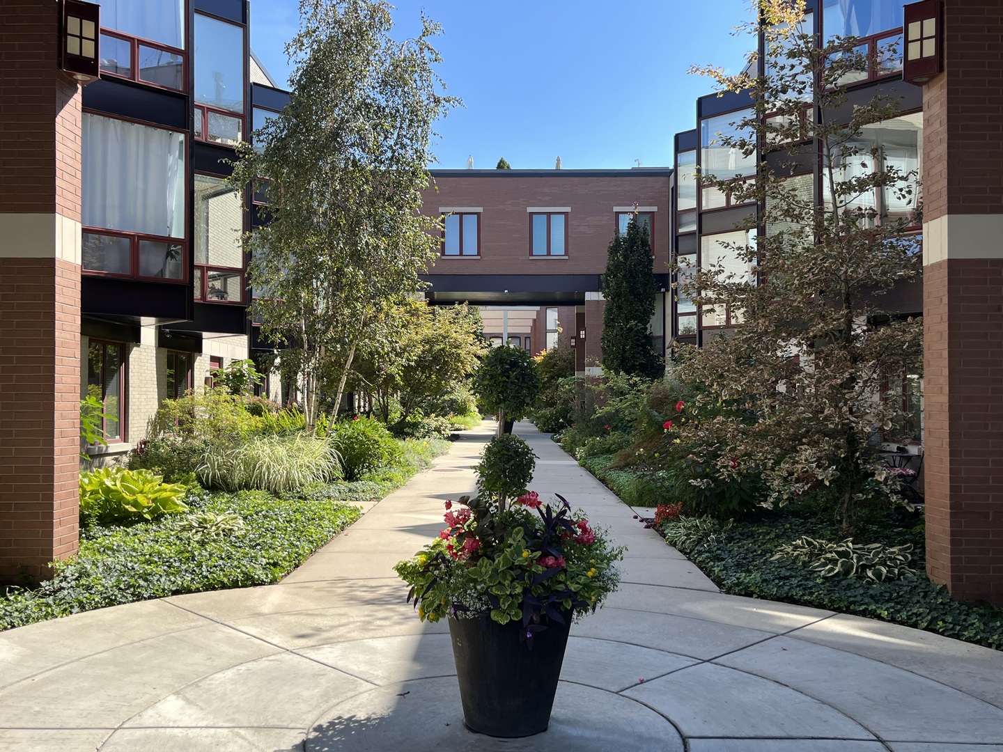 1246 West Cottage Place Chicago, IL 60607 - Photo 2 of 16 a view of a pathway with a house