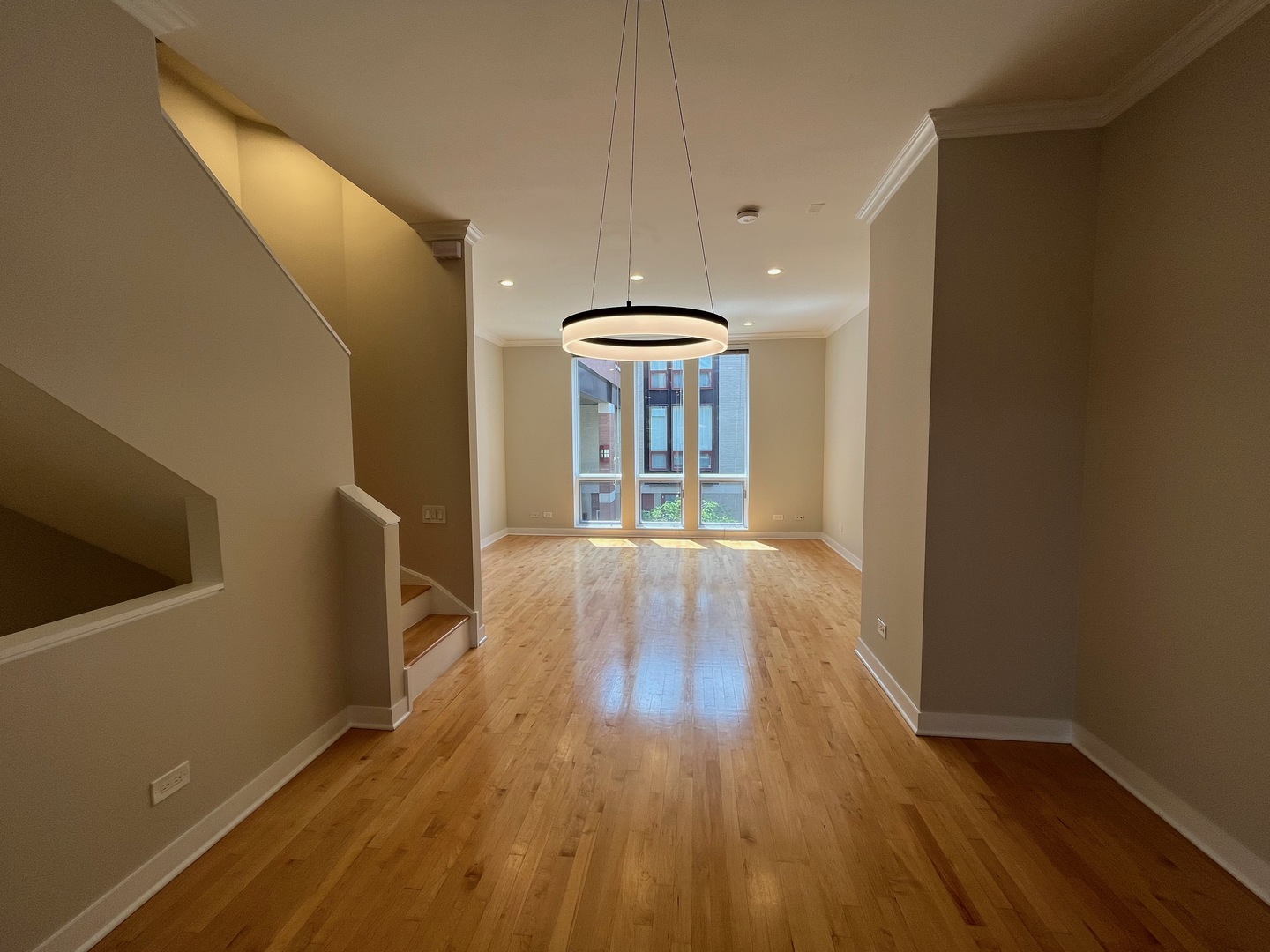 1246 West Cottage Place Chicago, IL 60607 - Photo 5 of 16 a view of a livingroom with wooden floor