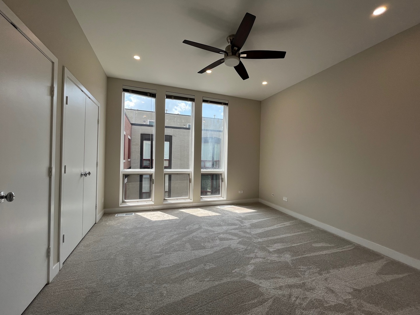 1246 West Cottage Place Chicago, IL 60607 - Photo 10 of 16 a view of an empty room with a window