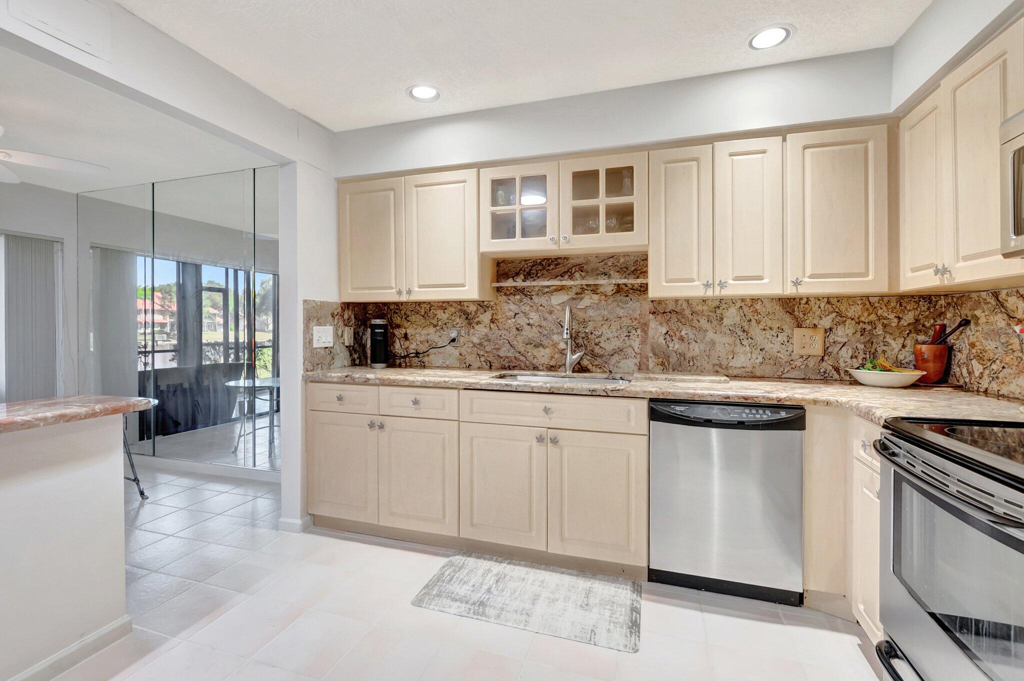 5731 Coach House Circle, Unit A Boca Raton, FL 33486 - Photo 17 of 44 GRANITE COUNTERTOPS