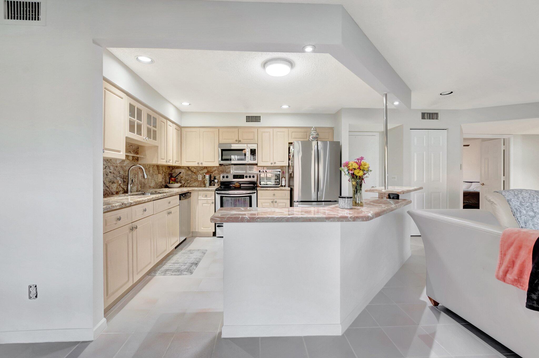 5731 Coach House Circle, Unit A Boca Raton, FL 33486 - Photo 18 of 44 STAINLESS STEEL APPLIANCES