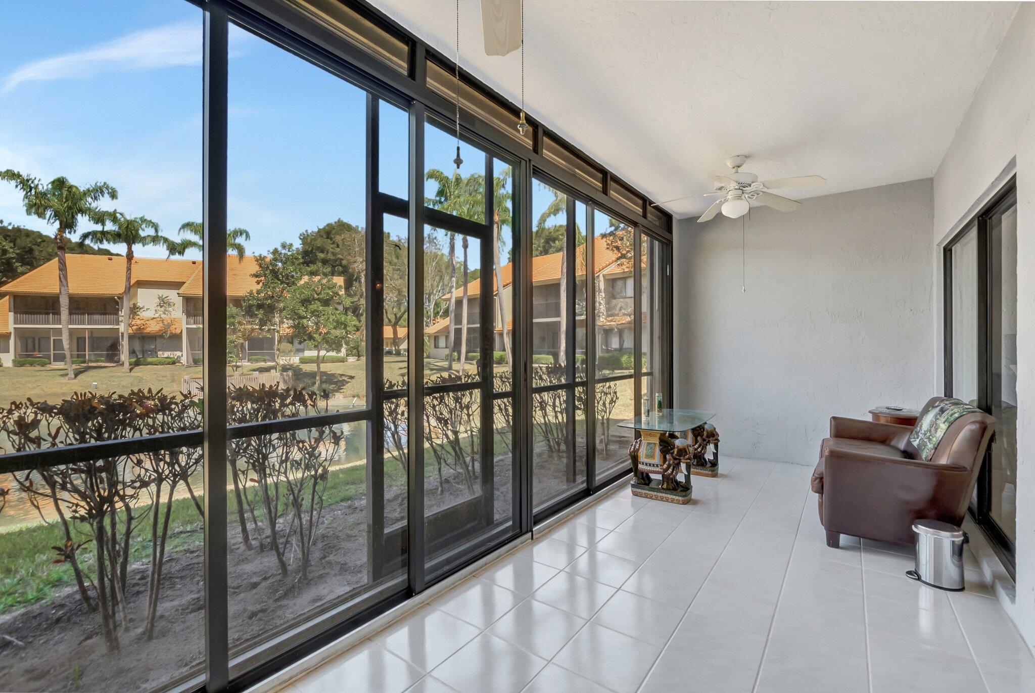 5731 Coach House Circle, Unit A Boca Raton, FL 33486 - Photo 22 of 44 LAKEVIEWS FROM PATIO