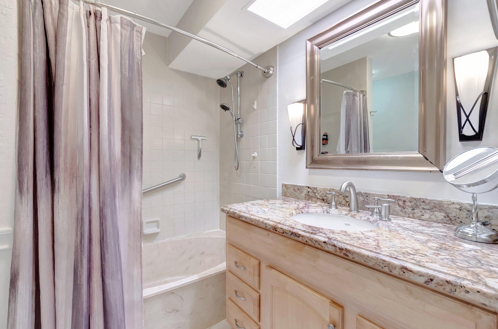5731 Coach House Circle, Unit A Boca Raton, FL 33486 - Photo 24 of 44 UPDATED BATH WITH TUB/SHOWER