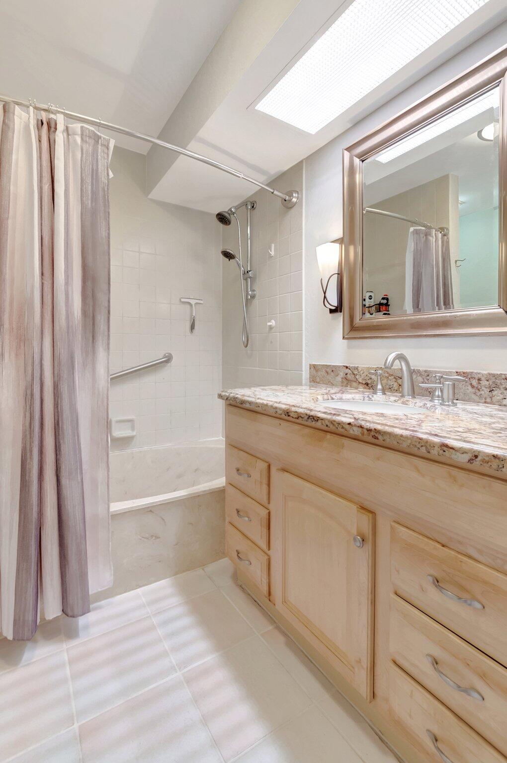5731 Coach House Circle, Unit A Boca Raton, FL 33486 - Photo 25 of 44 UPDATED GRANITE TOP VANITY
