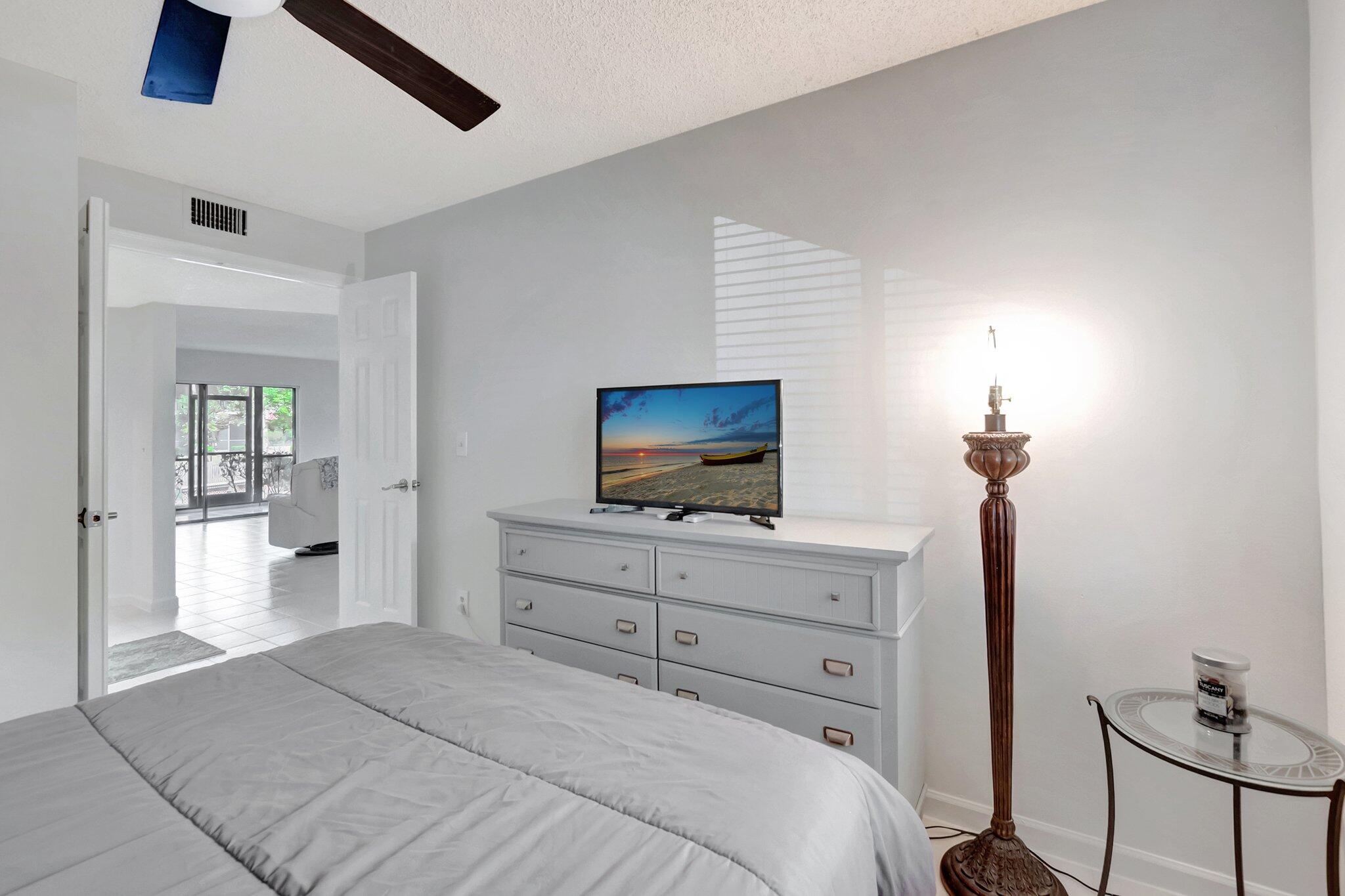 5731 Coach House Circle, Unit A Boca Raton, FL 33486 - Photo 27 of 44 GUEST BEDROOM