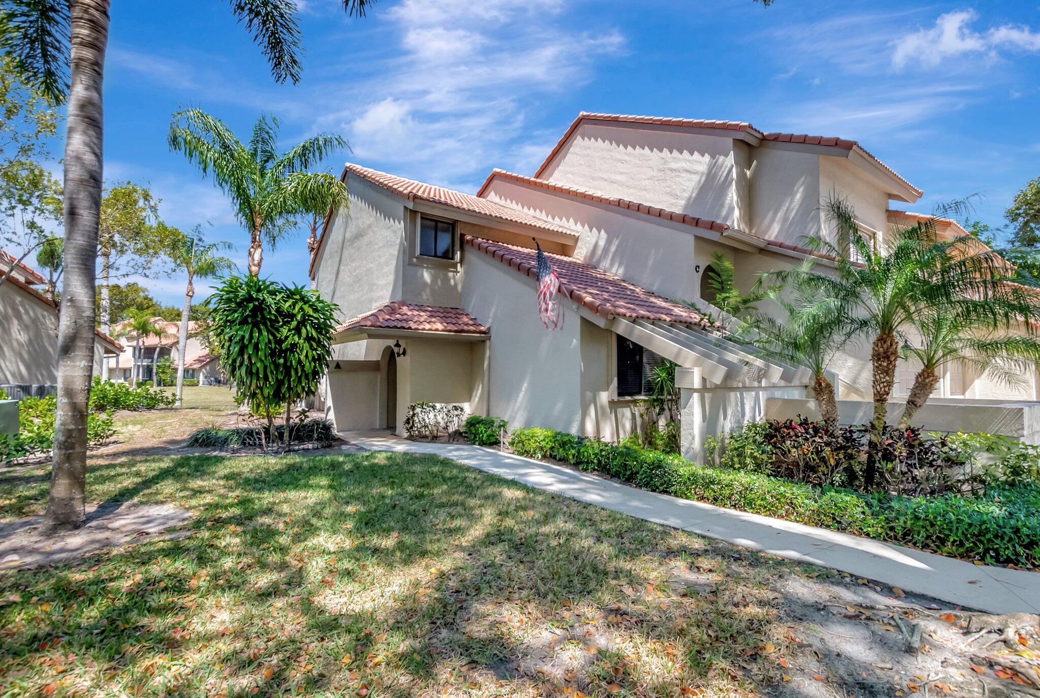 5731 Coach House Circle, Unit A Boca Raton, FL 33486 - Photo 3 of 44 CORNER UNIT WITH PRIVATE SIDE ENTRANCE