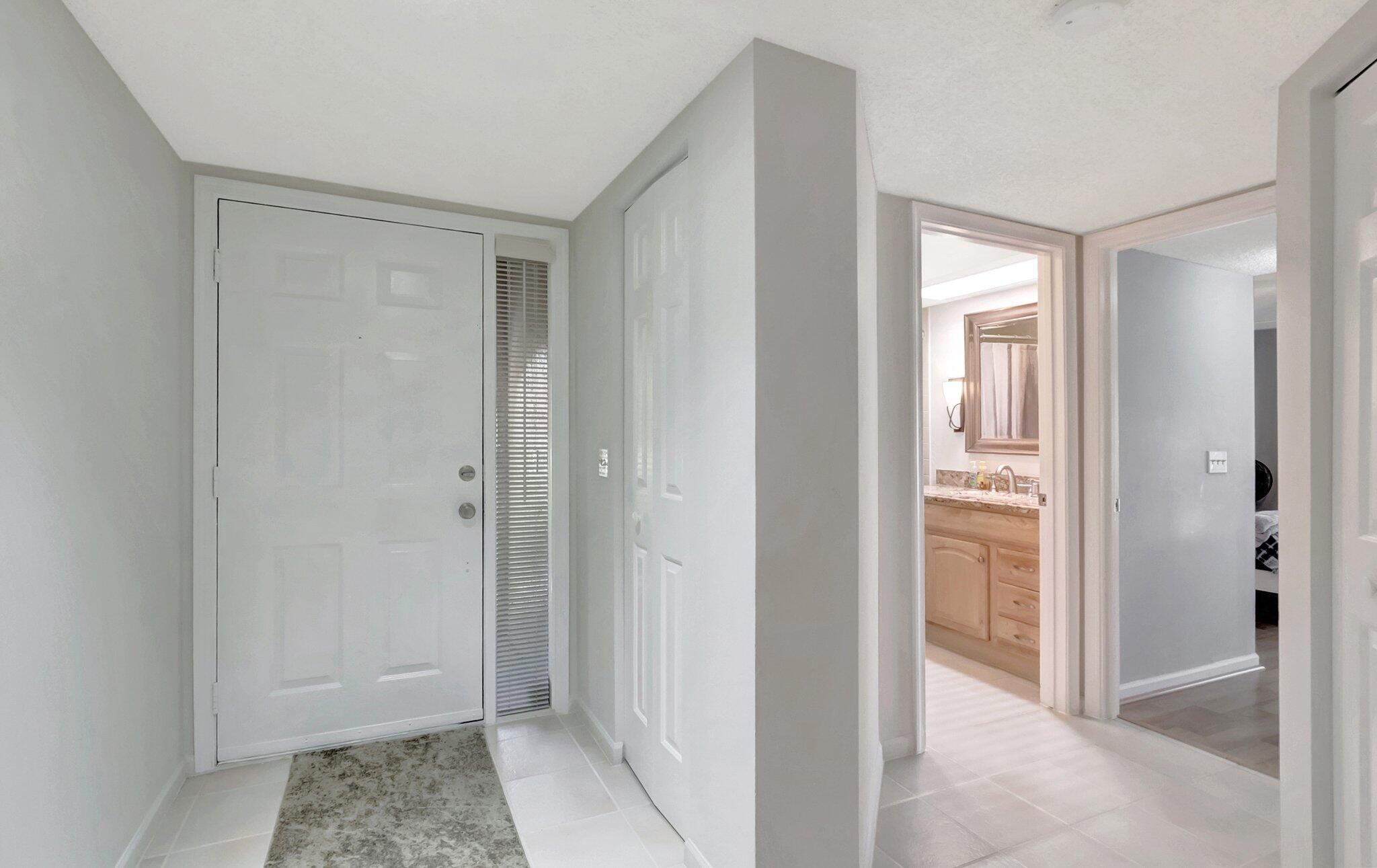 5731 Coach House Circle, Unit A Boca Raton, FL 33486 - Photo 6 of 44 INVITING ENTRY HALL