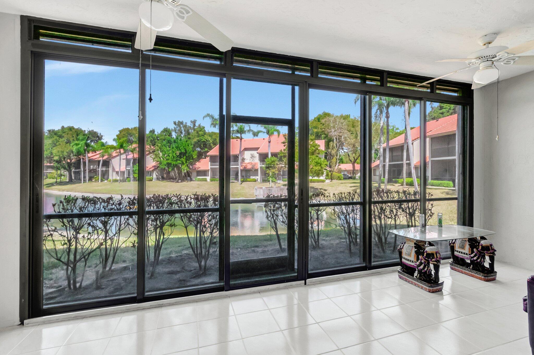 5731 Coach House Circle, Unit A Boca Raton, FL 33486 - Photo 8 of 44 FABULOUS LAKE & FOUNTAIN VIEWS