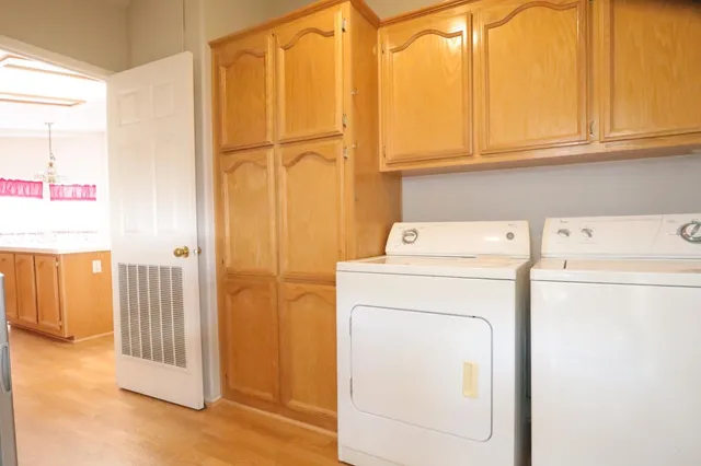 a utility room with dryer and washer
