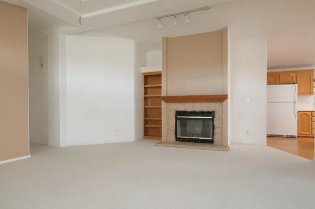 a view of a livingroom with a fireplace