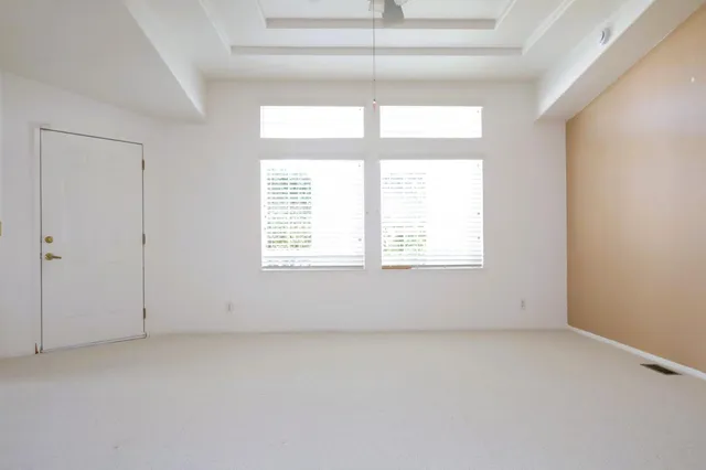 an empty room with windows