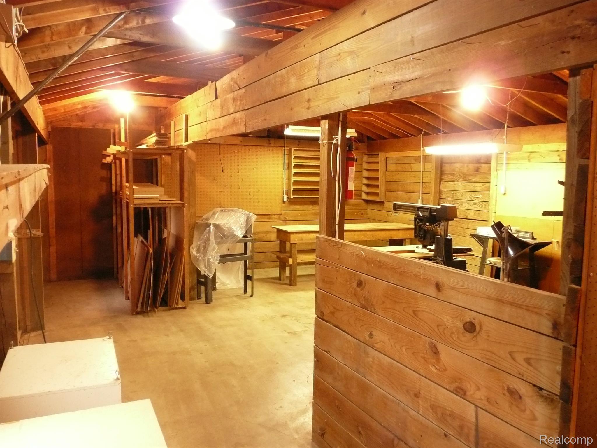 490 Sanders Road Oxford, MI 48371 - Photo 51 of 58 Work area in 2nd out building.