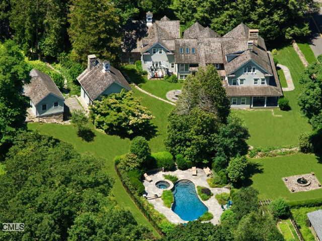 an aerial view of a house with a garden