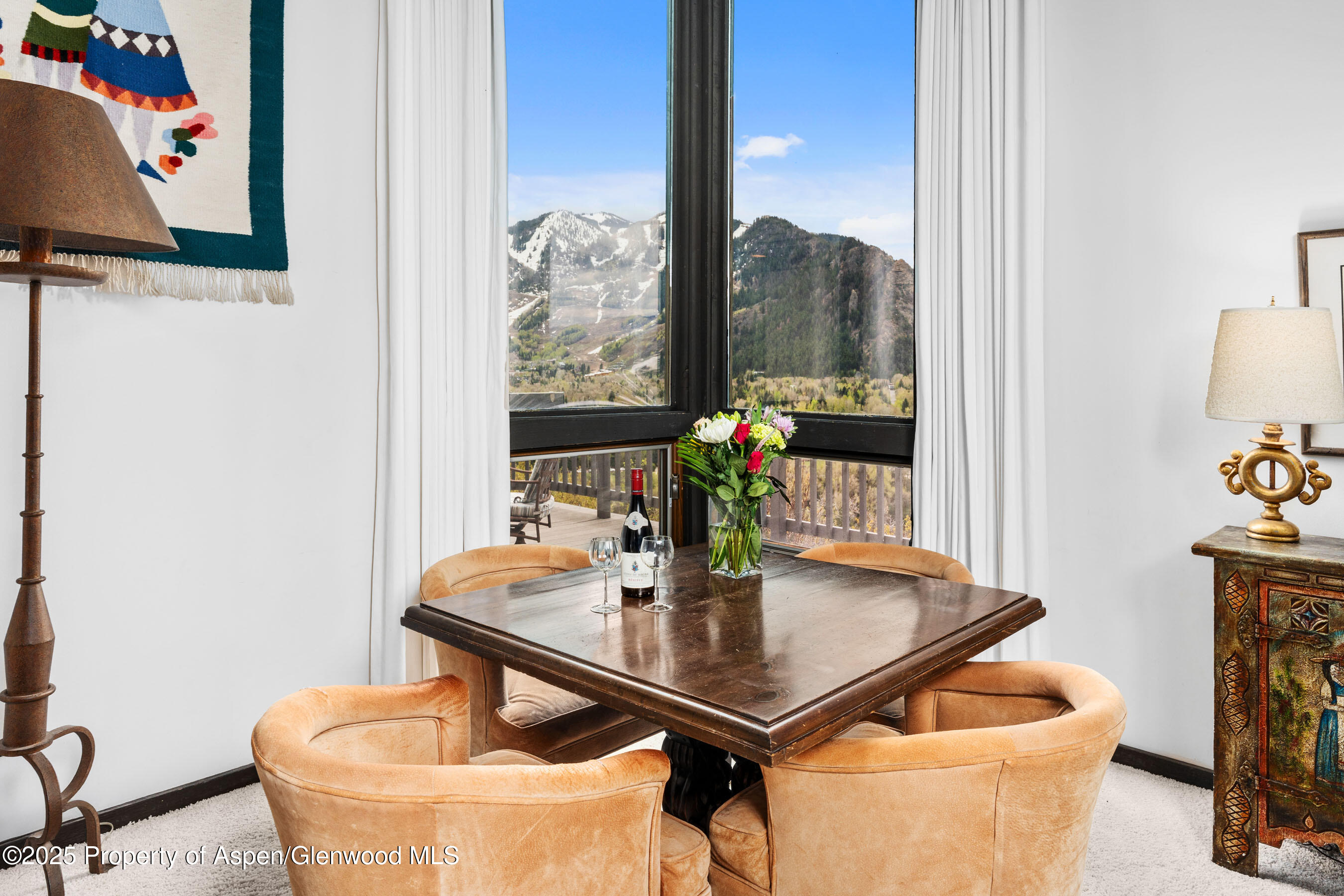 162 Bennett Bench Road Aspen, CO 81612 - Photo 14 of 46 a dining room with furniture and wooden floor