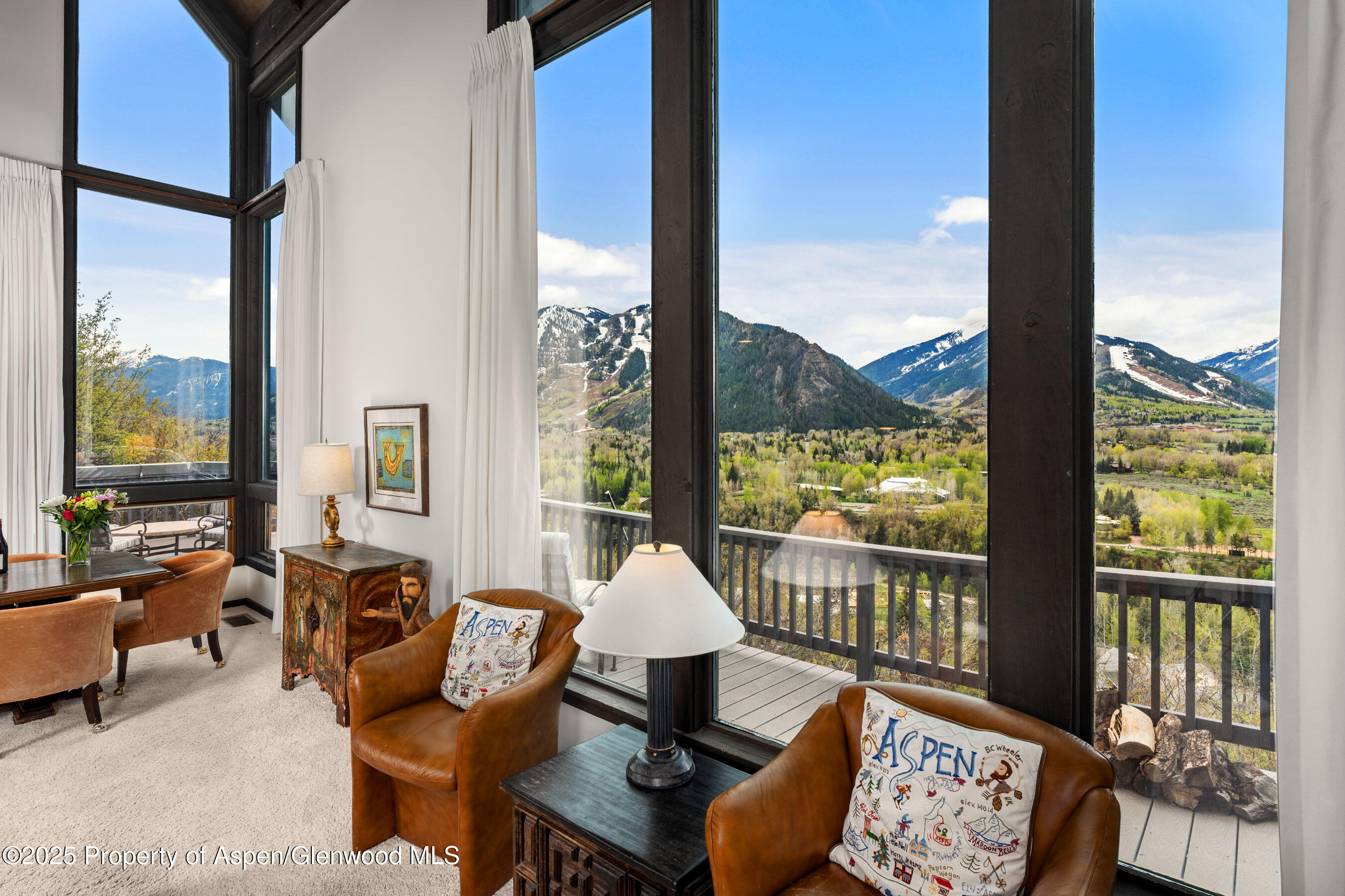 162 Bennett Bench Road Aspen, CO 81612 - Photo 15 of 46 a living room with furniture and floor to ceiling windows