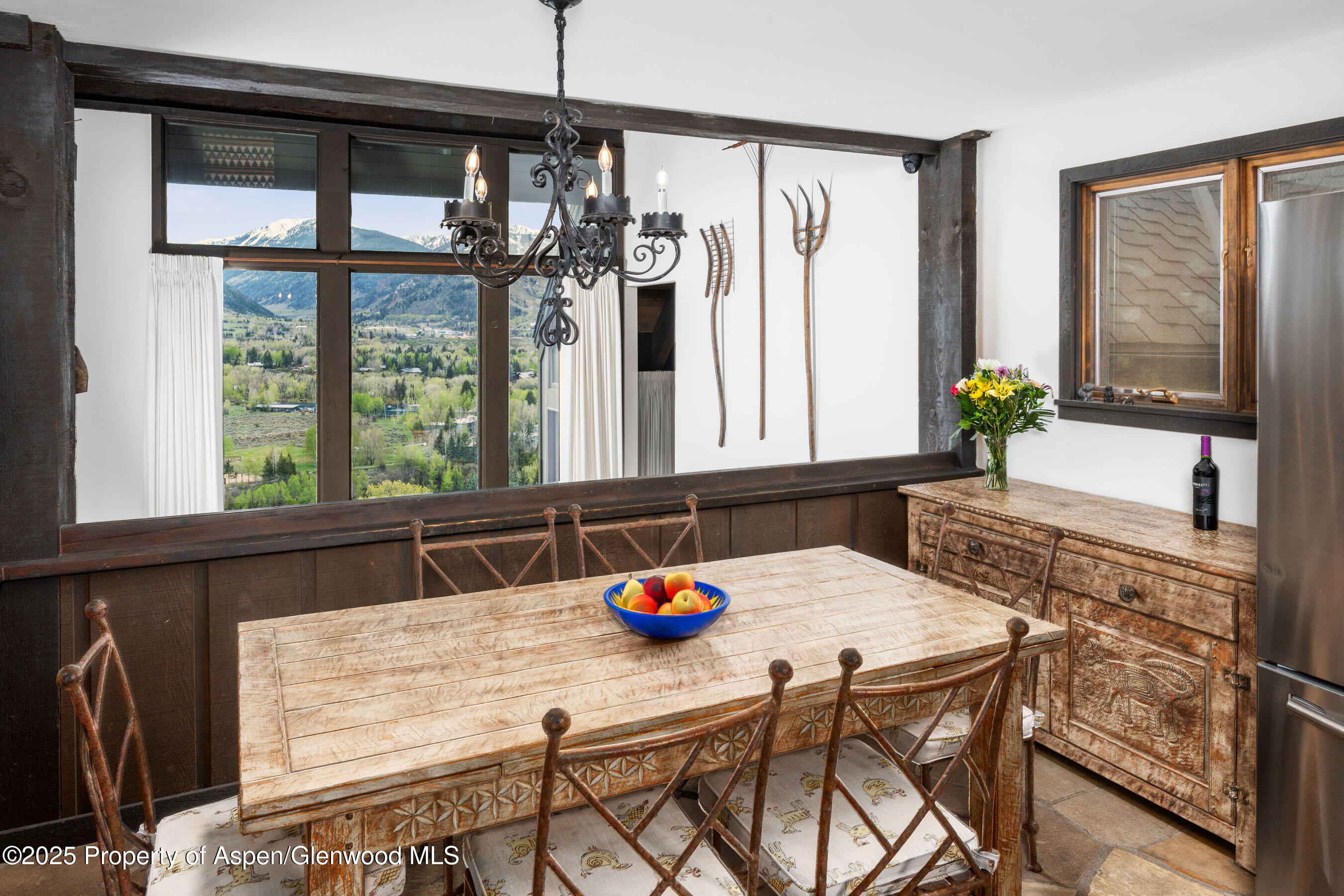 162 Bennett Bench Road Aspen, CO 81612 - Photo 17 of 46 a kitchen table with chairs and window