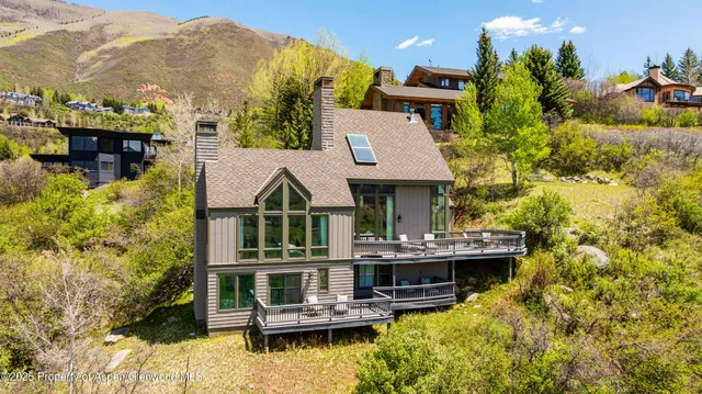 a view of balcony with furniture