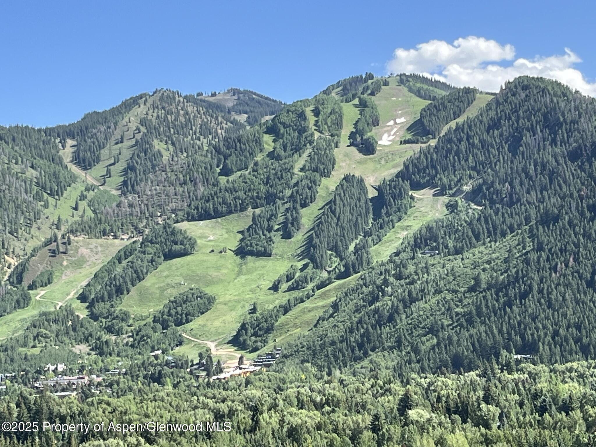 162 Bennett Bench Road Aspen, CO 81612 - Photo 43 of 46 a view of a house with a mountain in the background