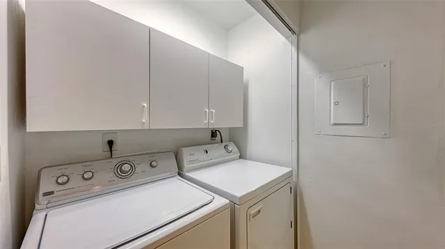 a view of a house with a tree