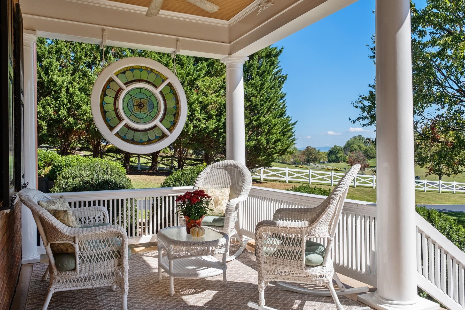 1739 Barterbrook Road Staunton, VA 24401 - Photo 16 of 74 a view of a patio with a table chairs and a garden