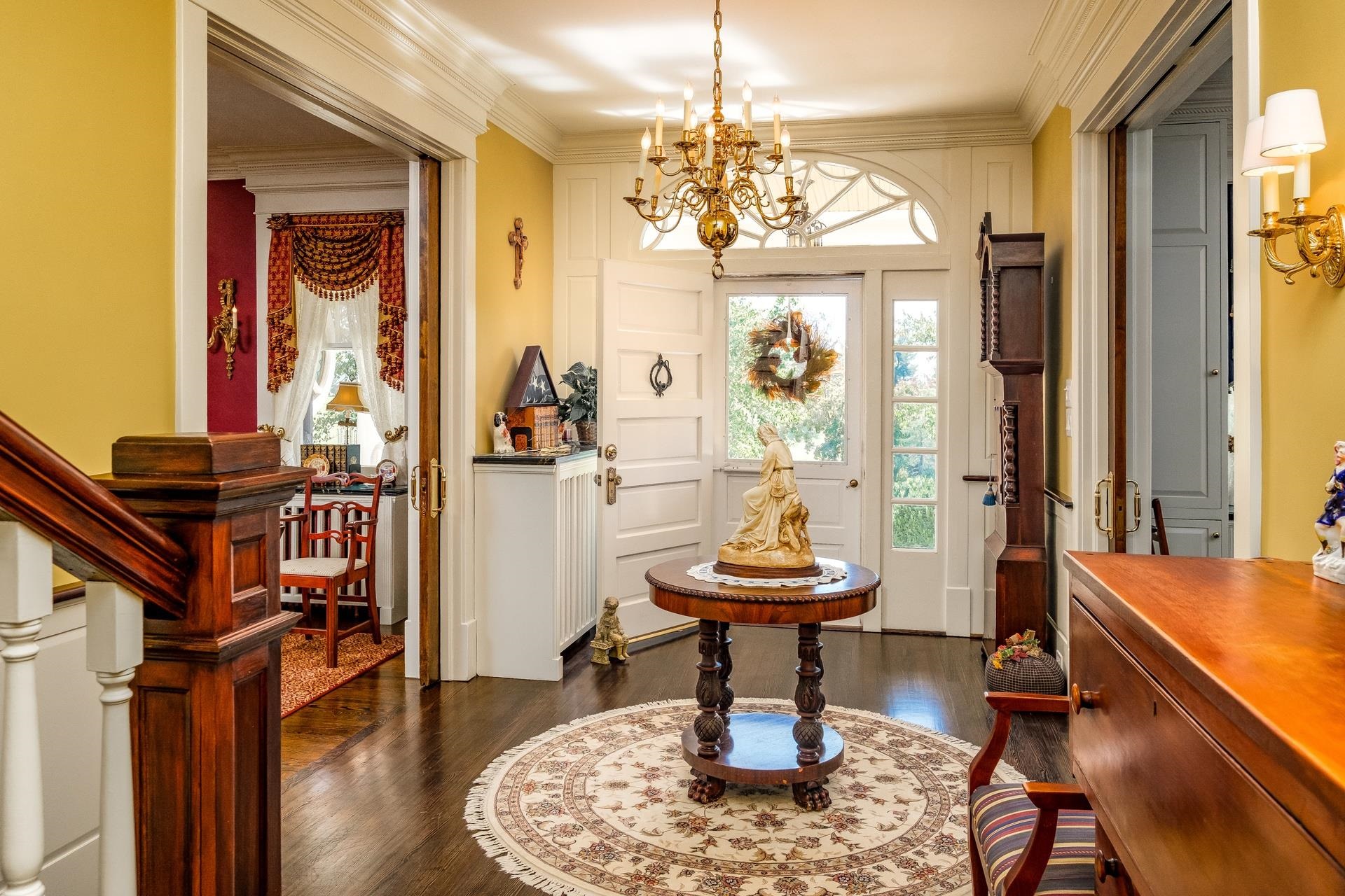 1739 Barterbrook Road Staunton, VA 24401 - Photo 20 of 74 a view of a livingroom with furniture a chandelier and wooden floor