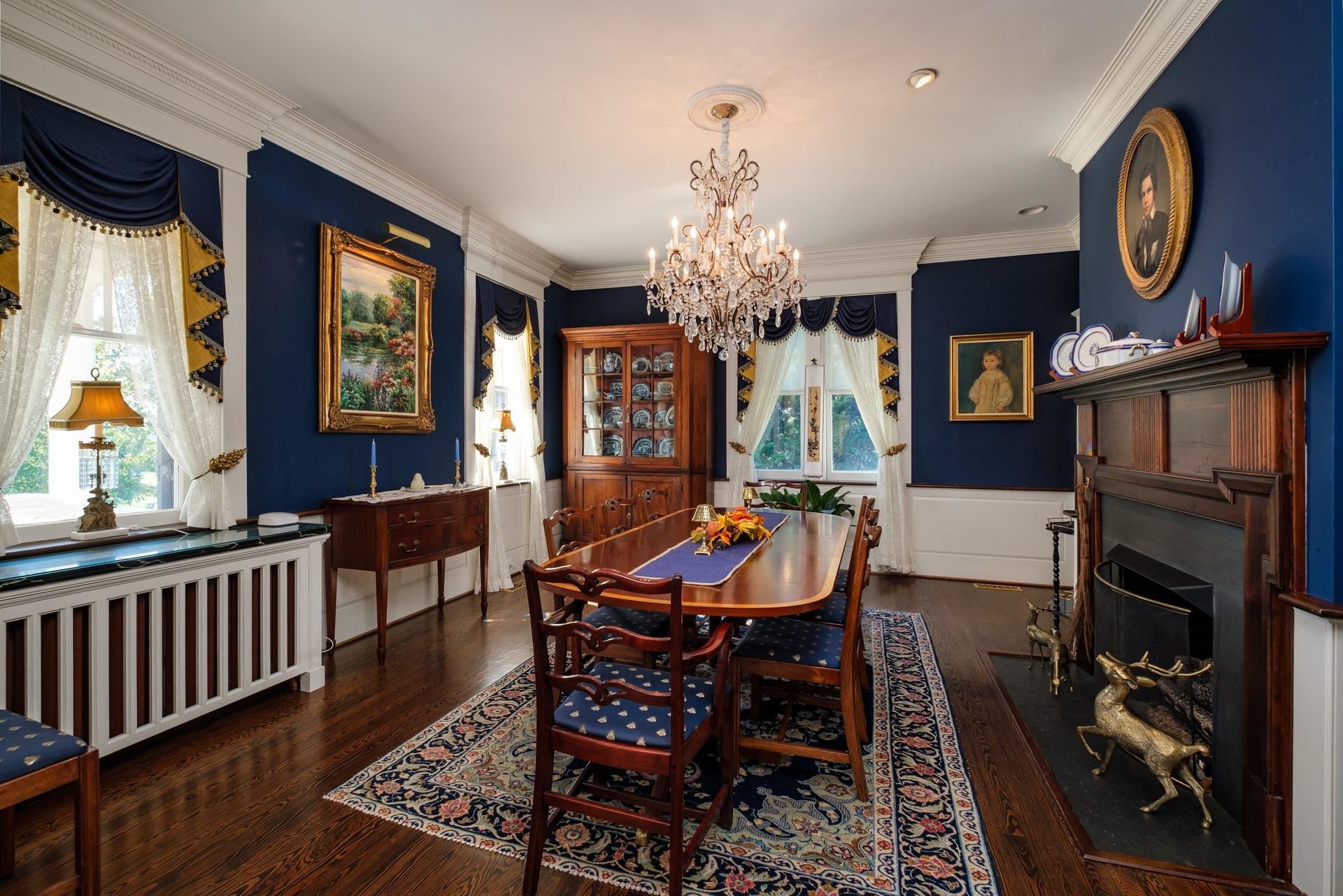 1739 Barterbrook Road Staunton, VA 24401 - Photo 28 of 74 a view of a dining room with furniture a chandelier and wooden floor