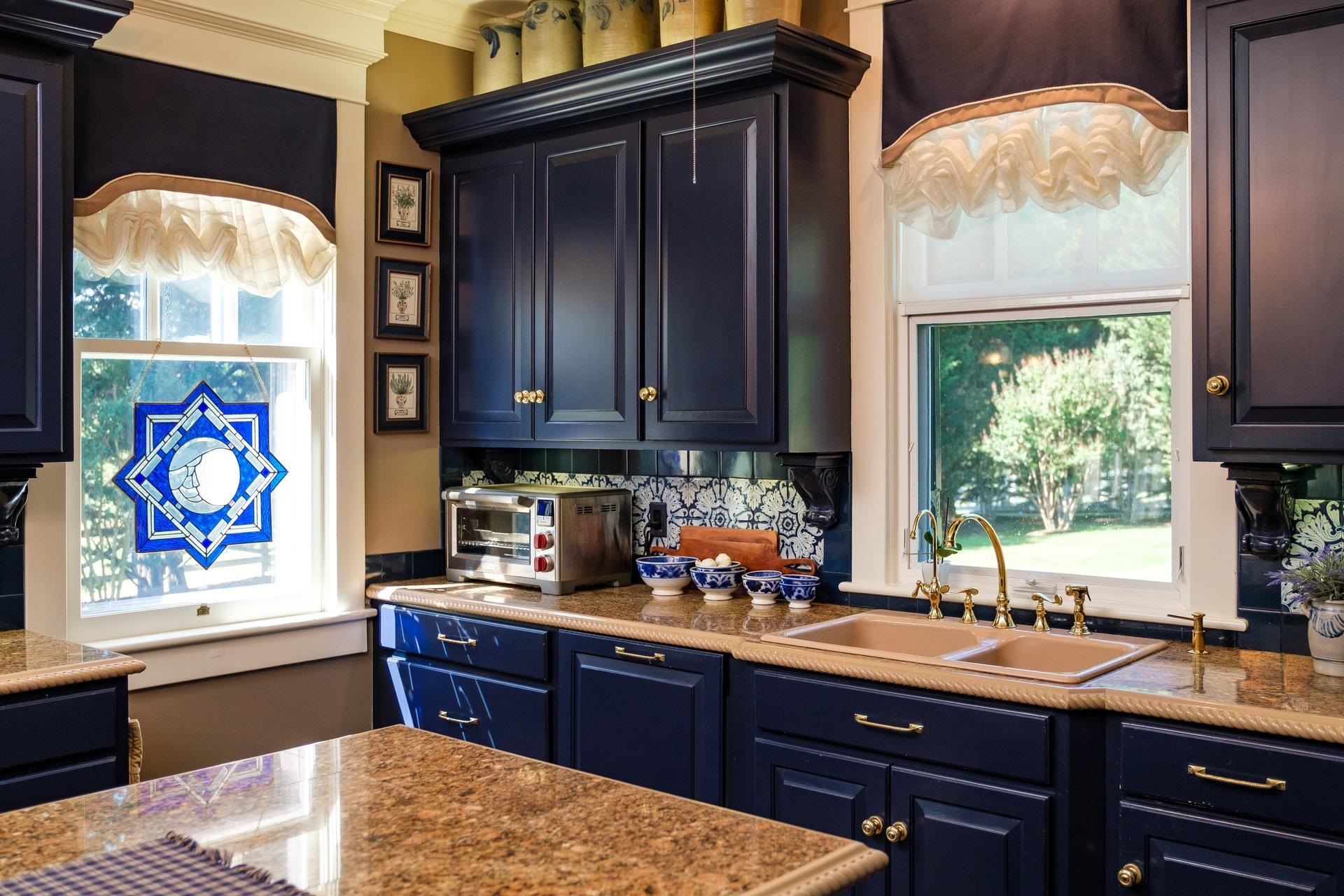 1739 Barterbrook Road Staunton, VA 24401 - Photo 39 of 74 a kitchen with stainless steel appliances granite countertop a sink stove and cabinets