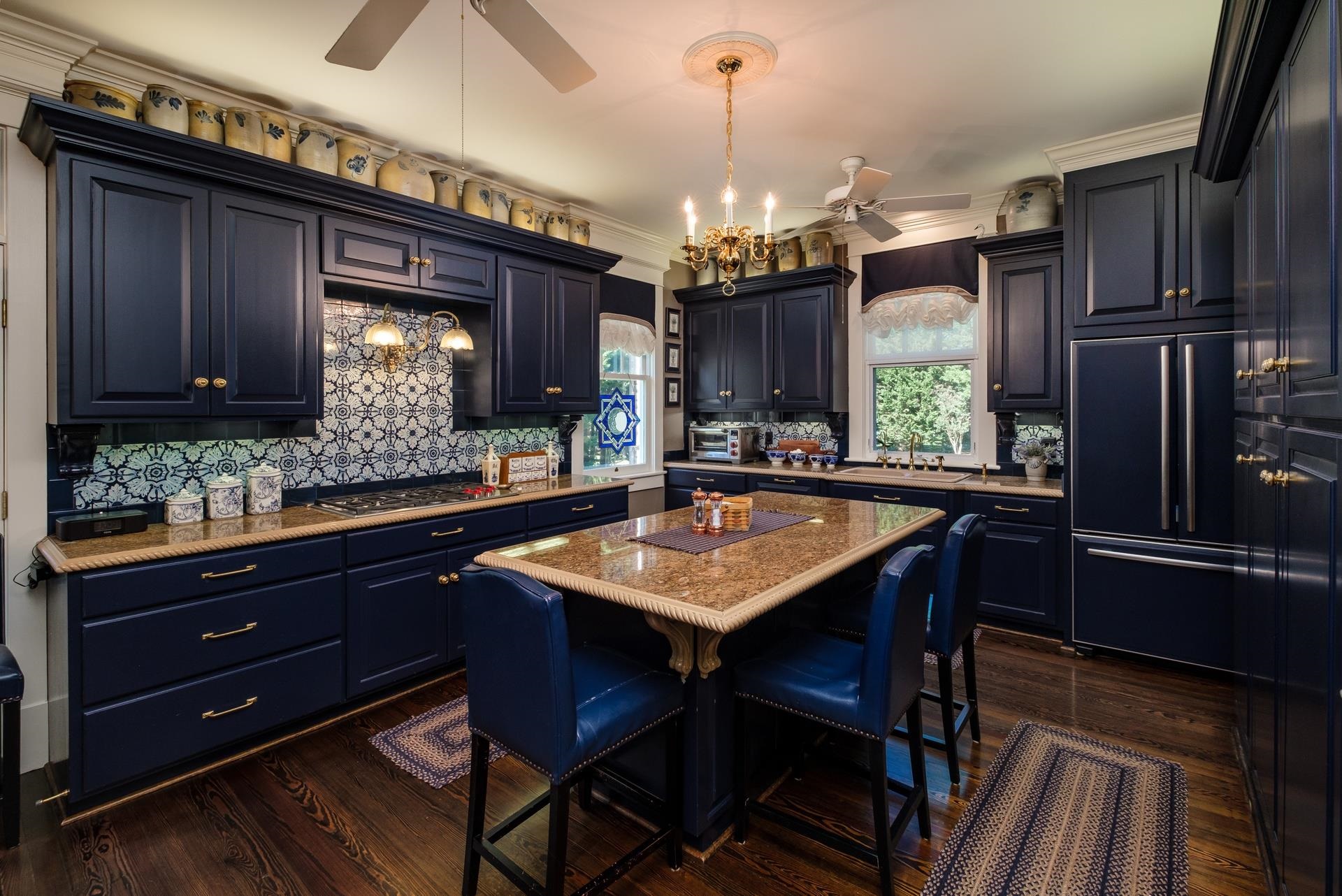 1739 Barterbrook Road Staunton, VA 24401 - Photo 40 of 74 a kitchen with stainless steel appliances granite countertop a sink a stove and a refrigerator