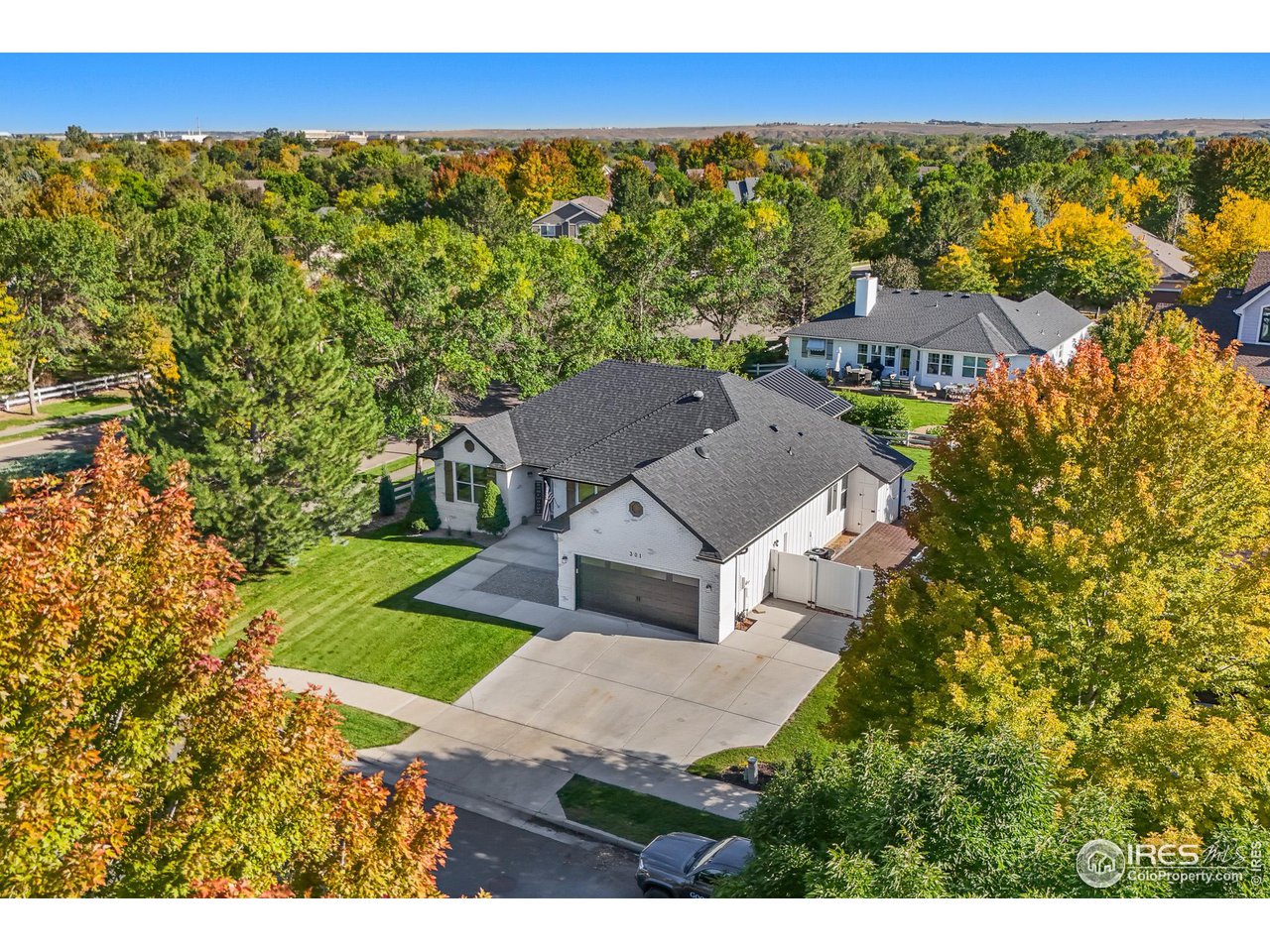 301 Pelican Cove Windsor, CO 80550 - Photo 2 of 38 a view of a house with a yard