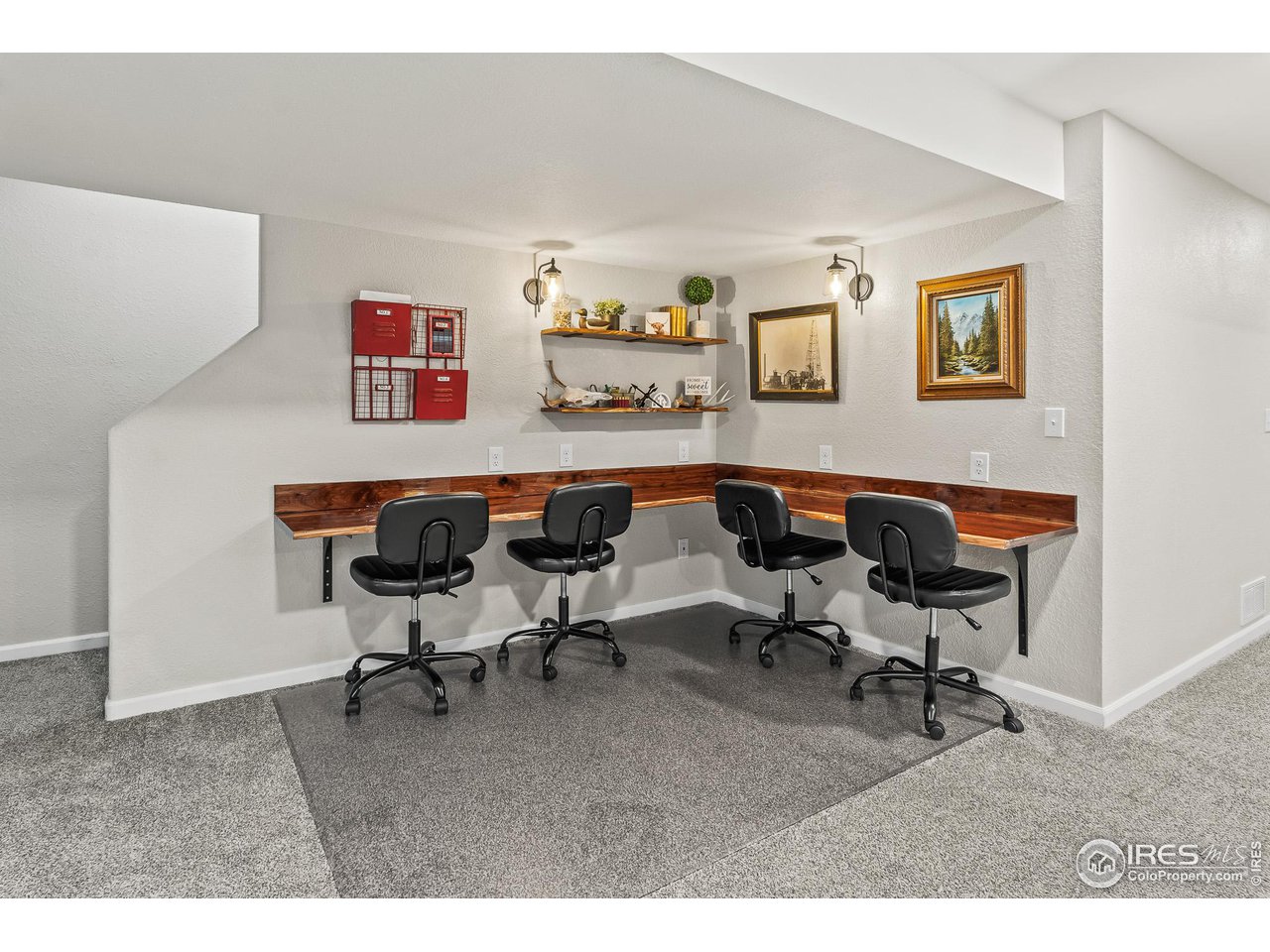 301 Pelican Cove Windsor, CO 80550 - Photo 21 of 38 a work room with lounge chair and a window