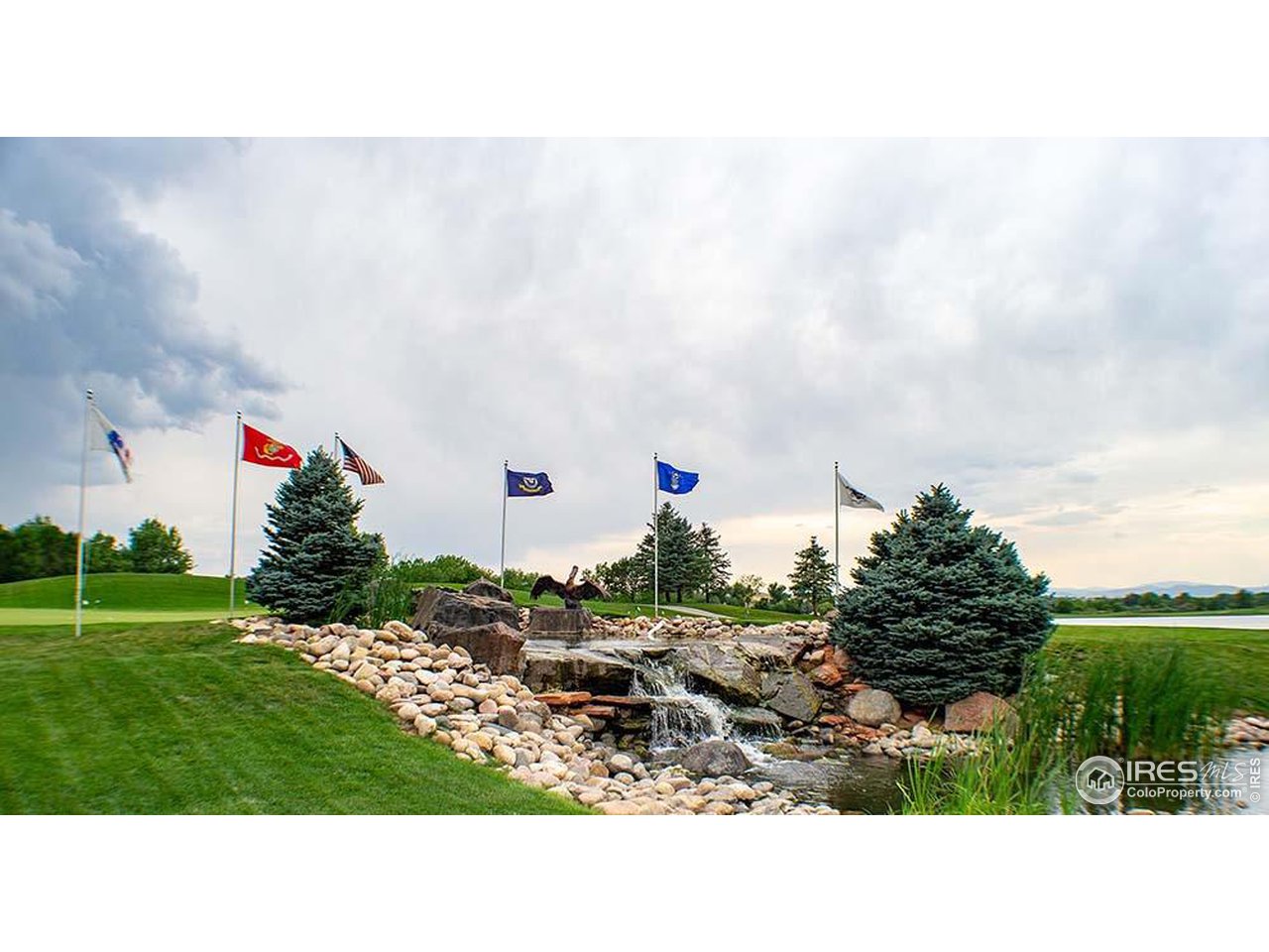 301 Pelican Cove Windsor, CO 80550 - Photo 34 of 38 a outdoor space with green space