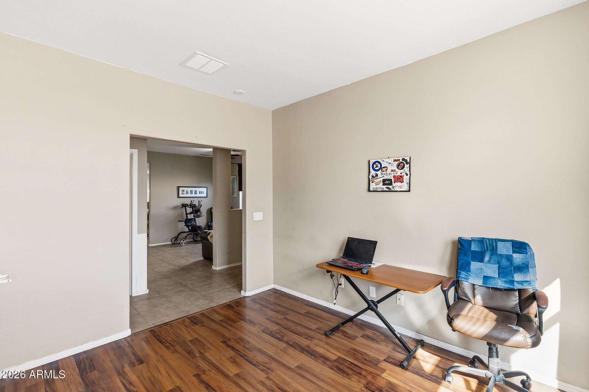 6718 West Darrel Road Laveen, AZ 85339 - Photo 24 of 49 a workspace with furniture and wooden floor