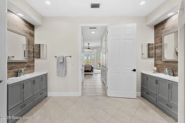 a kitchen with granite countertop a sink and cabinets