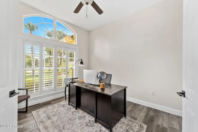 a bedroom with a bed and lamp